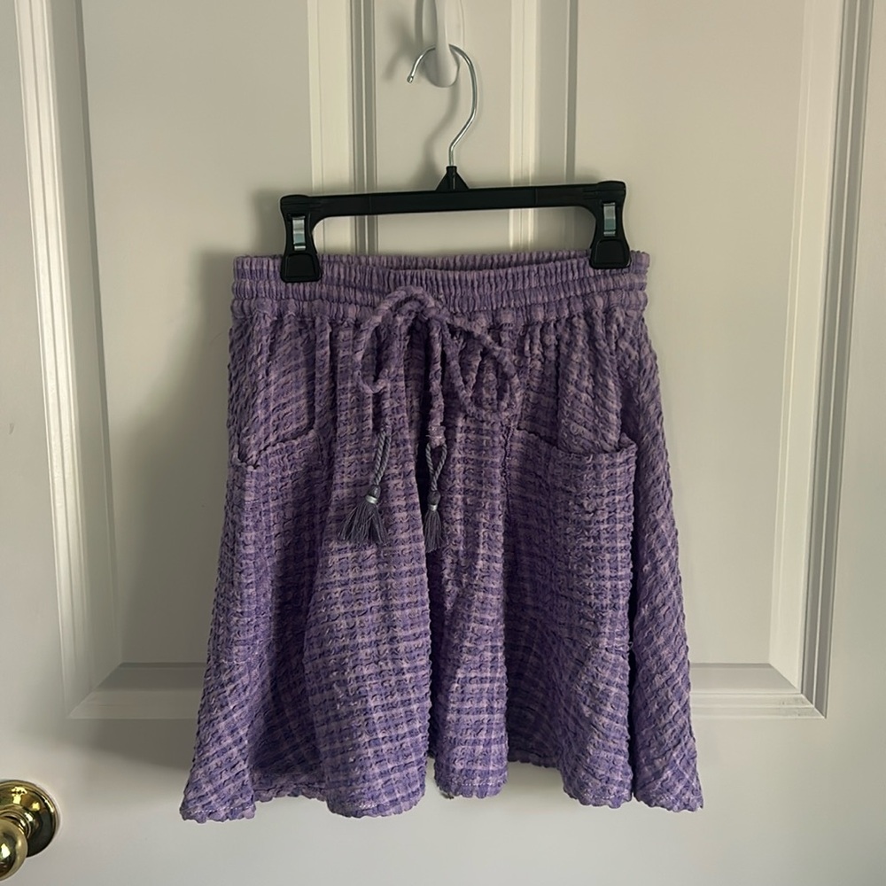 Float Purple Mini skirt with pockets and a tie